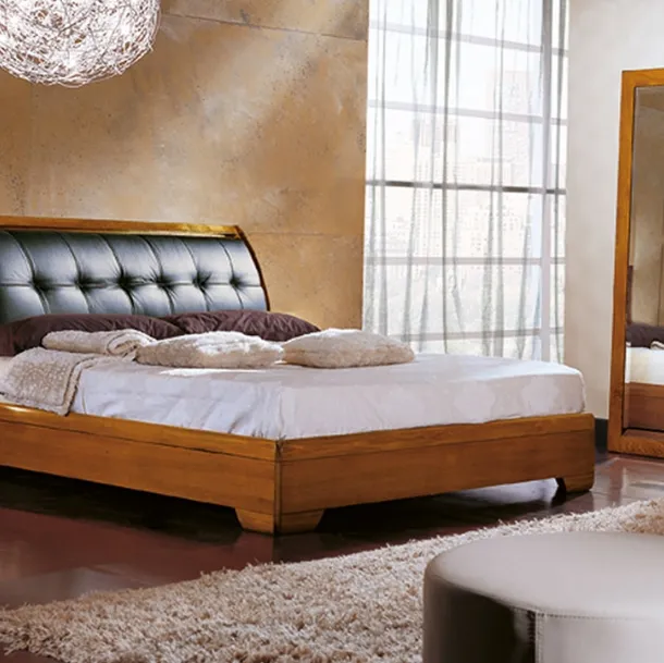 Letto in Legno con testiera a ribalta rivestita in Pelle imbottita e trapuntata City di Betamobili