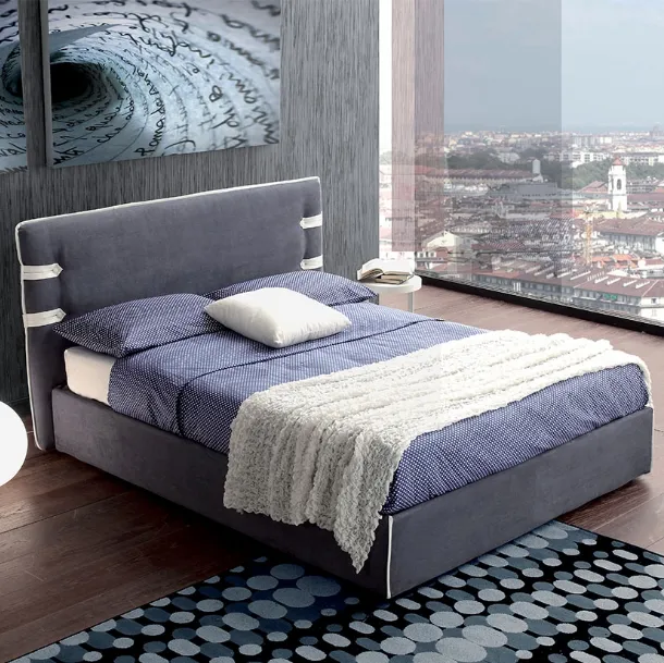 Letto in tessuto imbottito con testiera e box contenitore Park di Crippa Salotti
