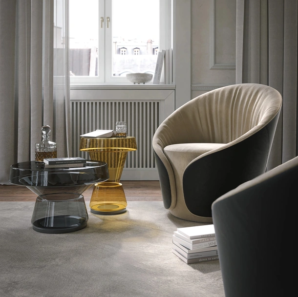 Poltroncina Mama in tessuto e pelle di Tonin Casa