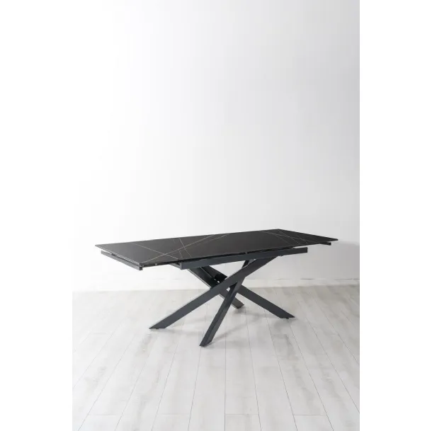 Tavolo allungabile Ares in veramica marmo nero con base in metallo di Stones